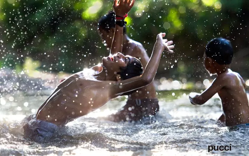 Costa-Rica-Happiest-country-kids-in-water-Pucci-Howler
