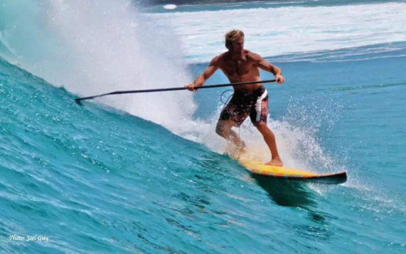 laird Hamilton paddle surfing